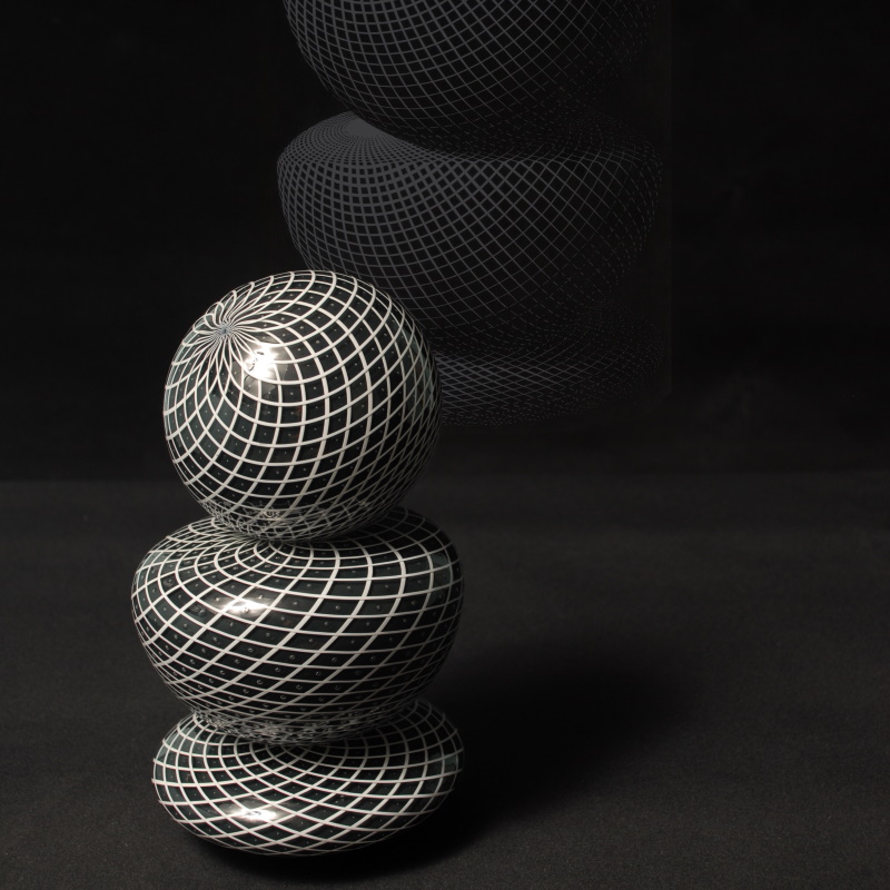 https://mcfaddenartglass.com/wp-content/uploads/2019/10/McFadden-Art-Glass-3-spheres-MC-Escher.jpg